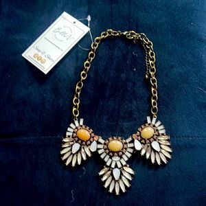 Statement necklace. Gold cabin with lavender, rose and taupe colored gems